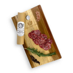 White Truffle Salami sliced and served on a gourmet charcuterie board, showcasing its artisanal natural casing and the rich truffle aroma.