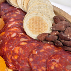 Angel’s Salumi and Truffles – Spanish Cantimpalo Salami Slices Served with Manchego, Figs, and Almonds