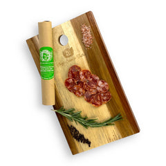 Sliced Soppressata Piccante Salami served on a charcuterie board