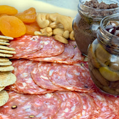 Angel’s Salumi and Truffles – Pre-Sliced Nostrano House Salami on a Charcuterie Board with Cheese and Antipasti