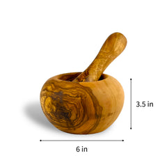 Wooden mortar and pestle with dimensions indicated on a white background