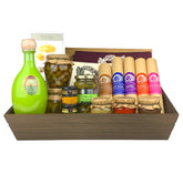 A dark wooden gift box filled with various antipasti and salami