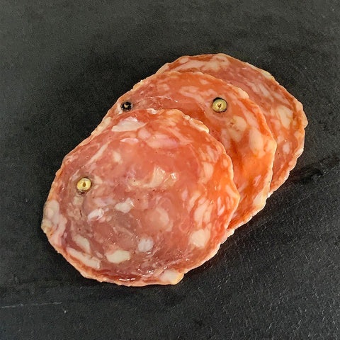 Detail shot of sliced nostrano salami 