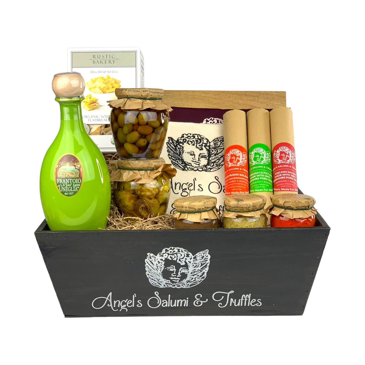 A dark wooden gift box filled with various antipasti and salami