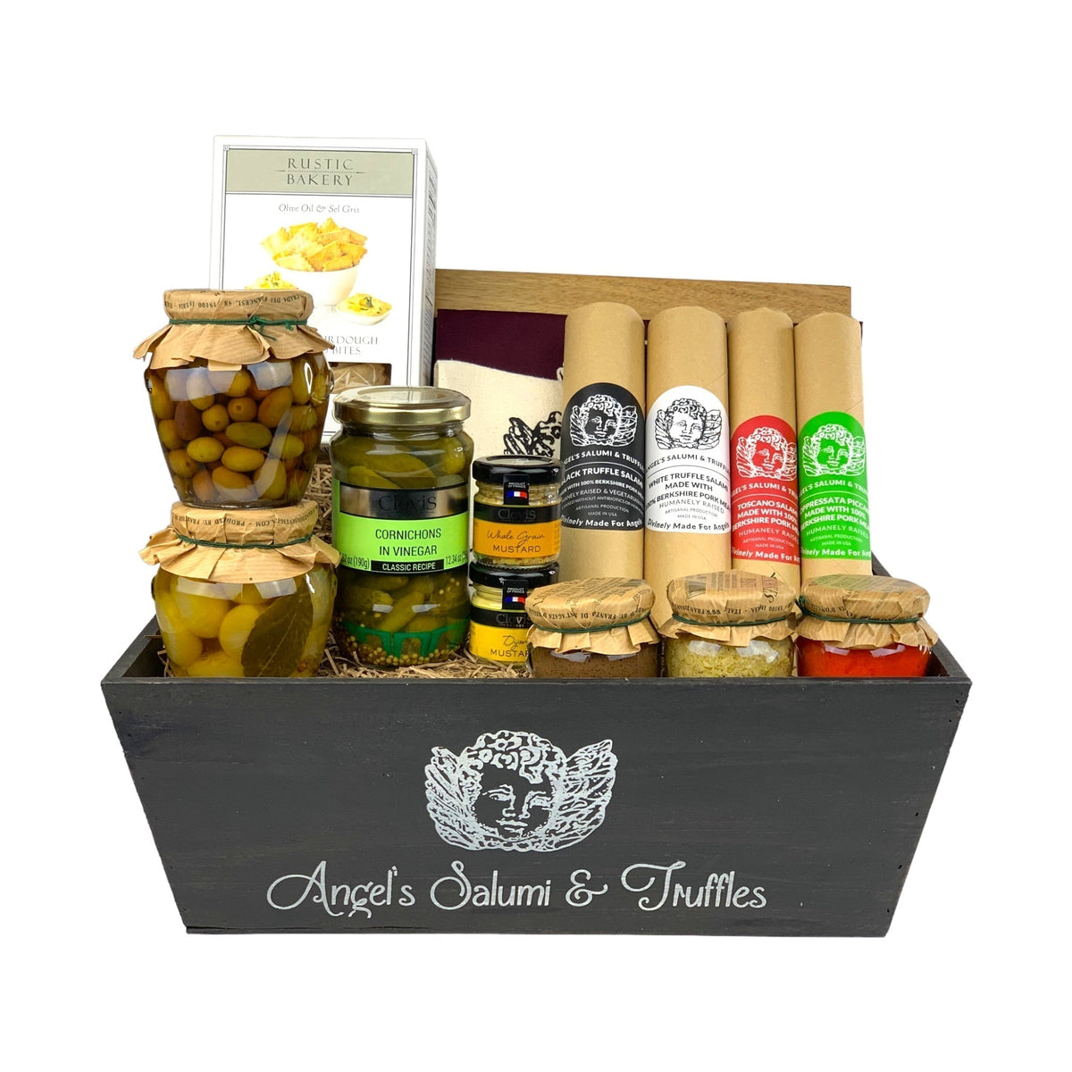  A dark wooden gift box filled with various antipasti and salami