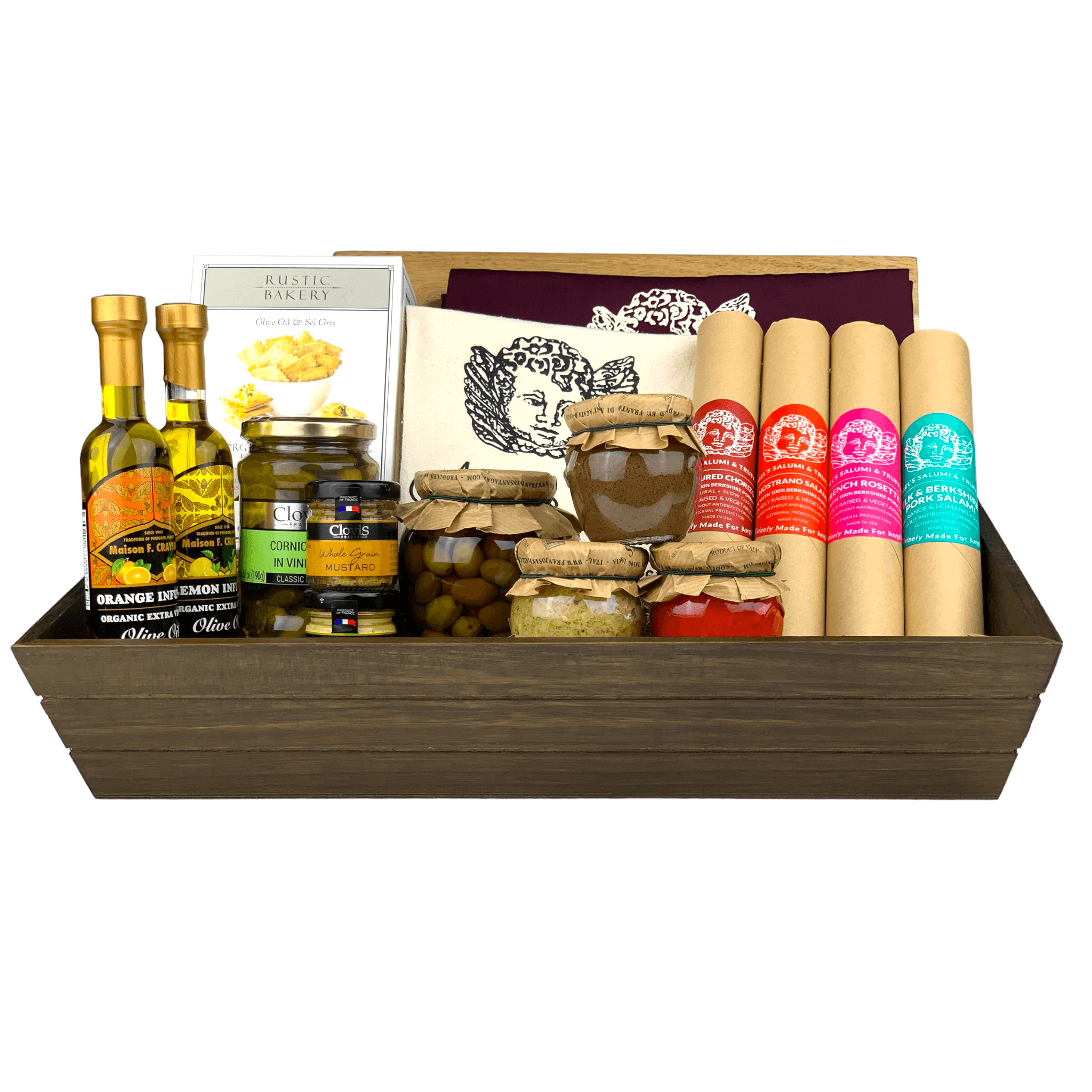 A dark wooden gift box filled with various antipasti and salami