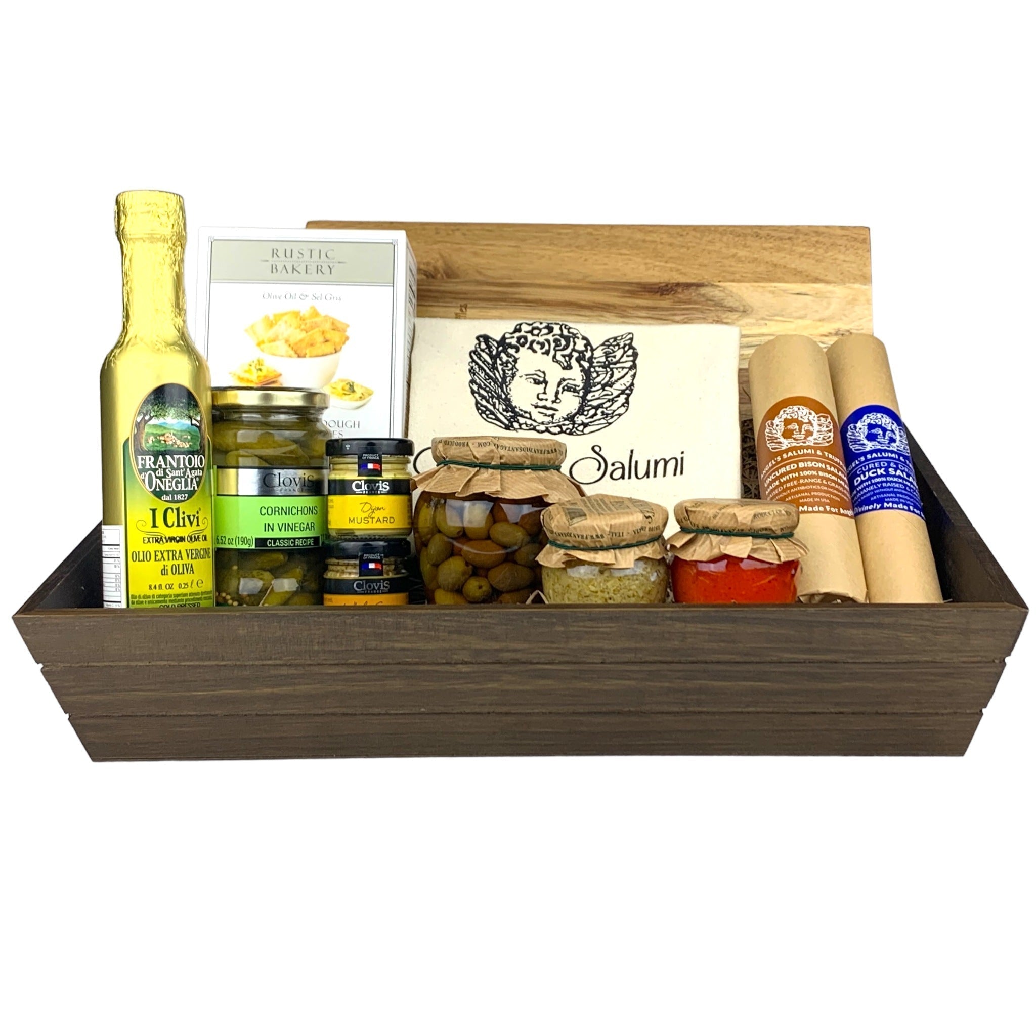 A dark wooden gift box filled with various antipasti and salami